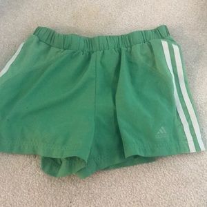 Green adidas shorts